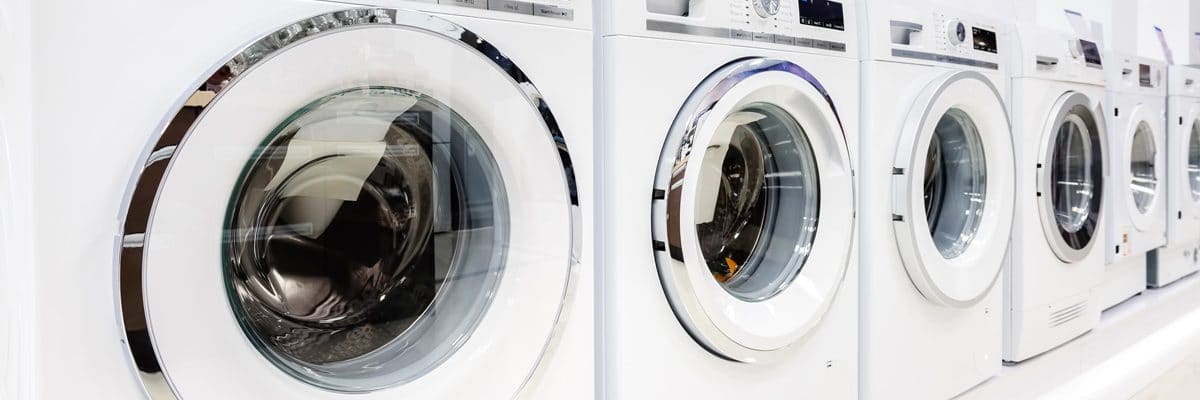 Une rangée de lave-linge et de sèche-linge, quelles sont leurs différences ?